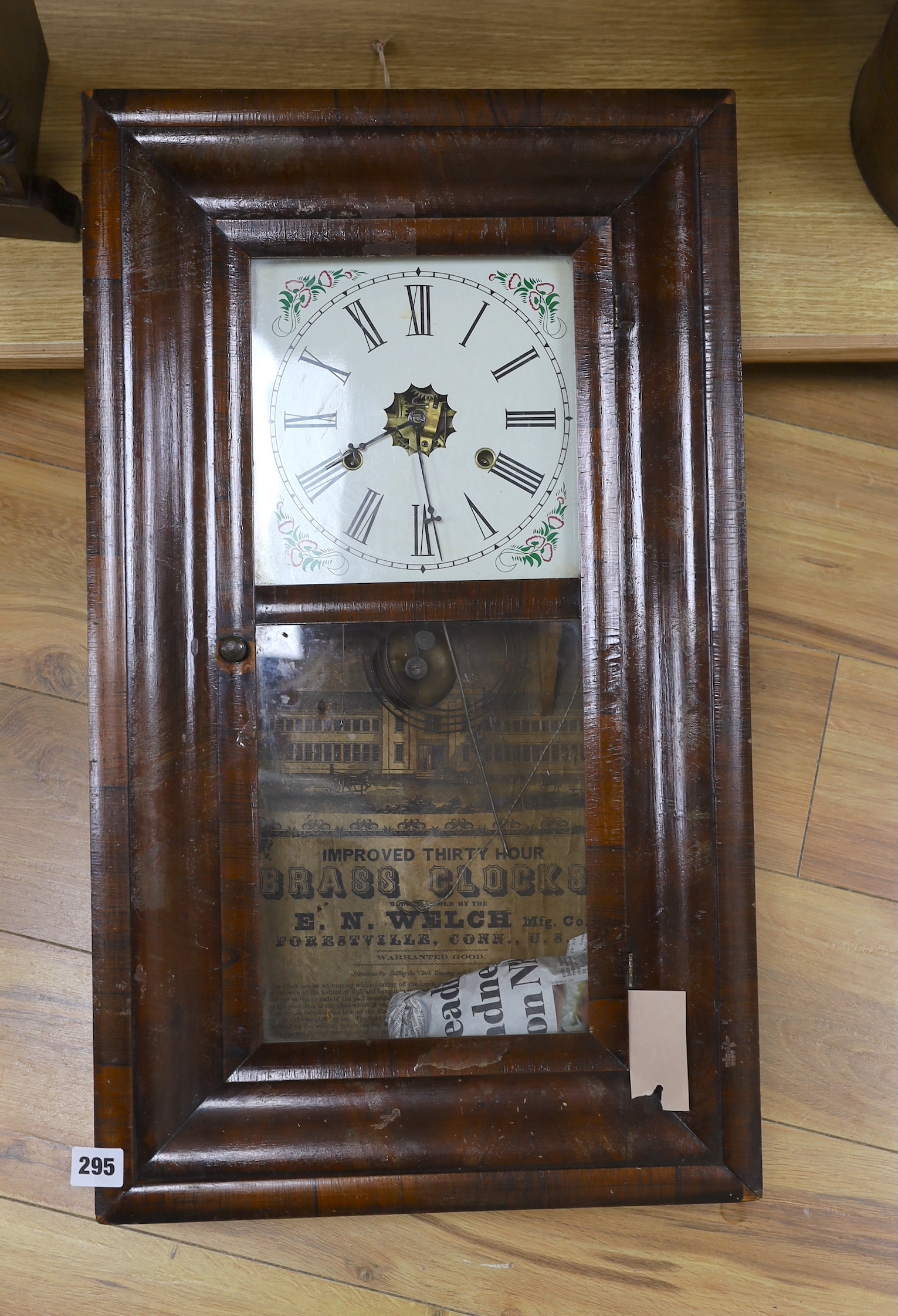 An oak cased mantel clock and an American wall clock